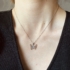 Kép 3/3 - Ezüst nyaklánc cirkónia kövekkel díszített pillangó medállal